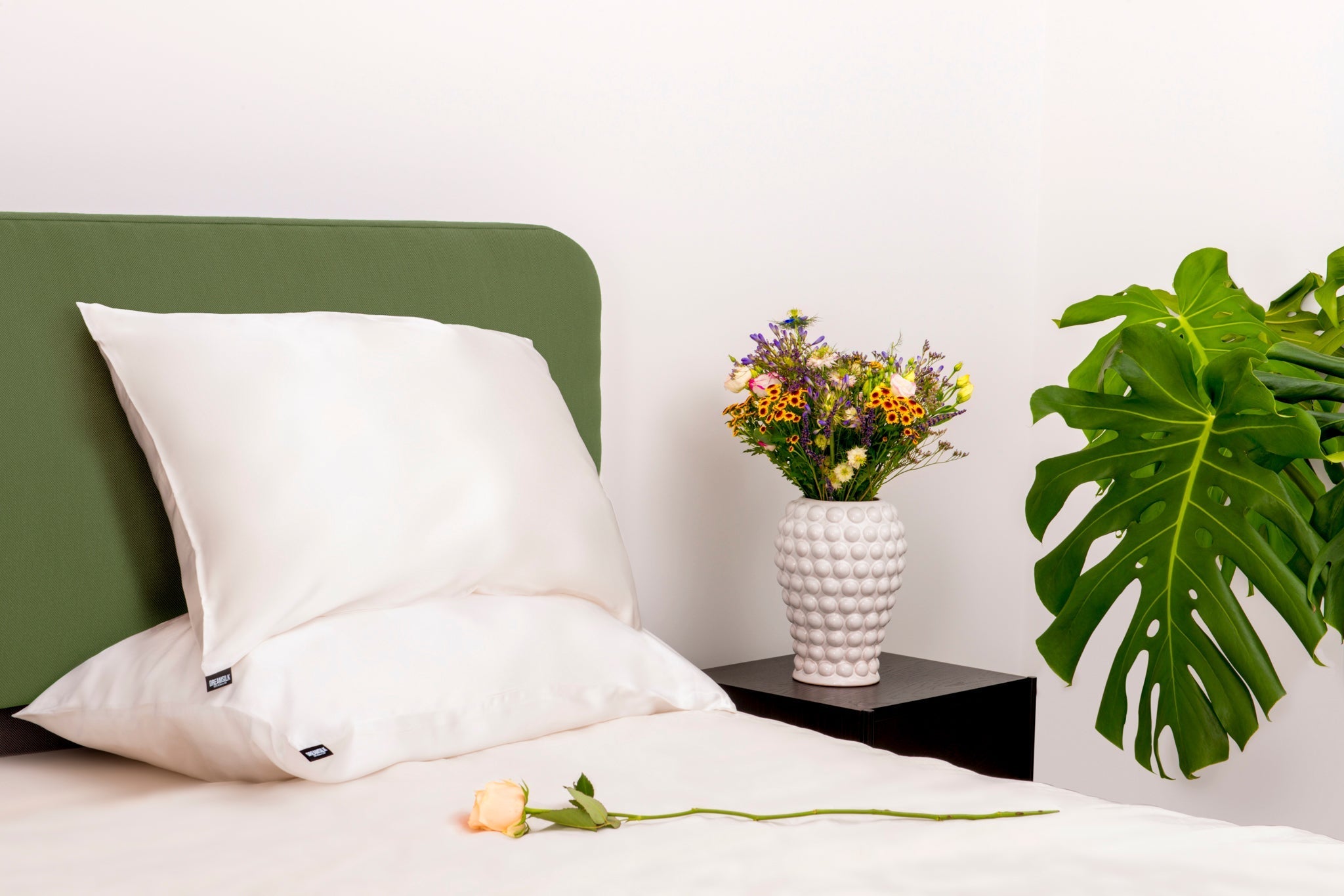 Luxury DREAMSILK mulberry silk pillowcase styled in a bedroom