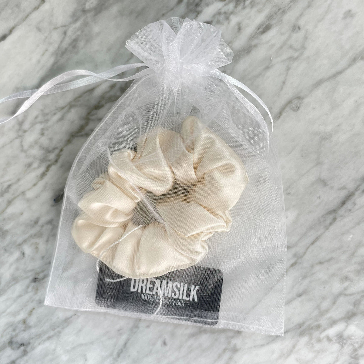 DREAMSILK scrunchie worn in the hair