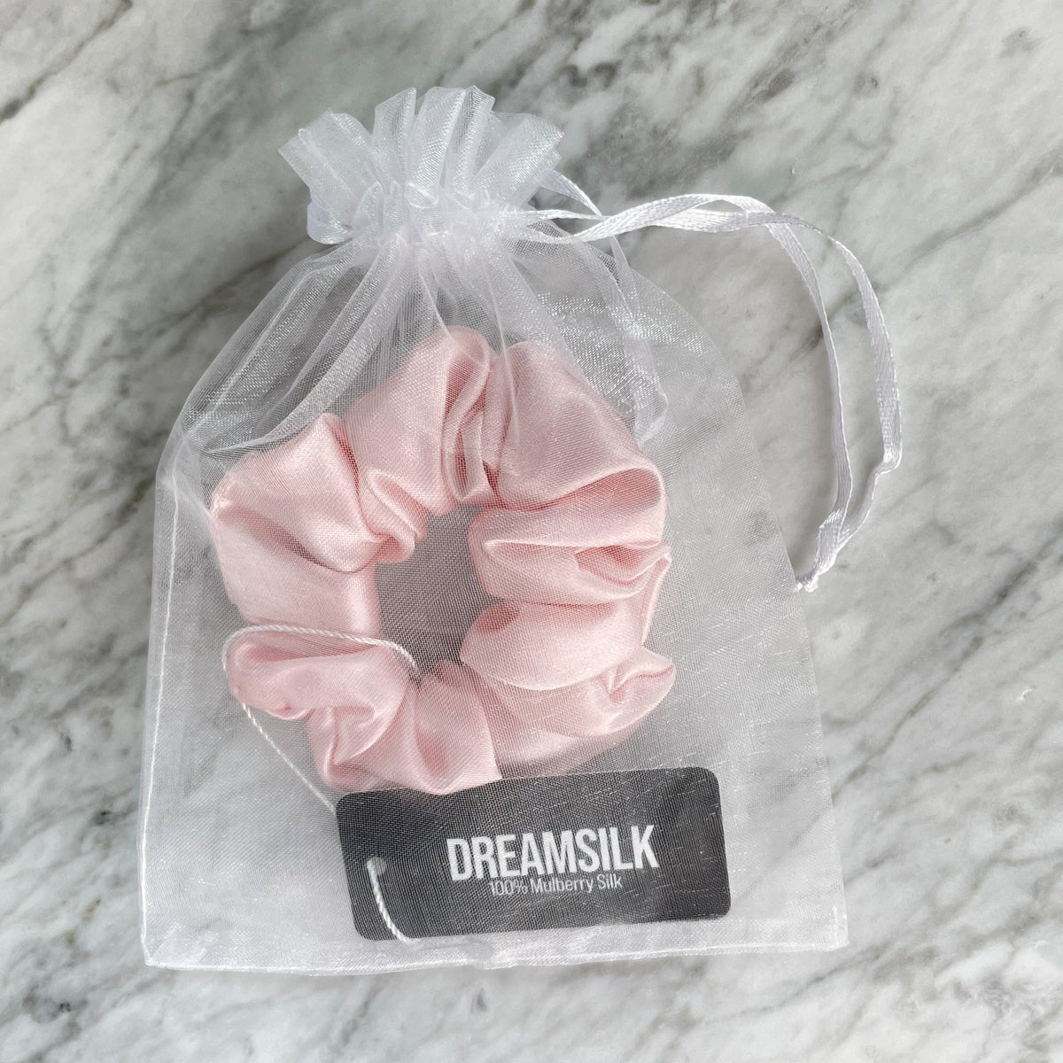 DREAMSILK scrunchie worn in the hair