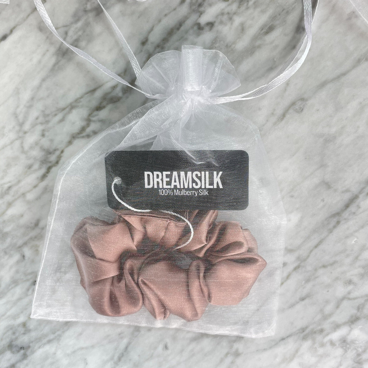 DREAMSILK scrunchie worn in the hair